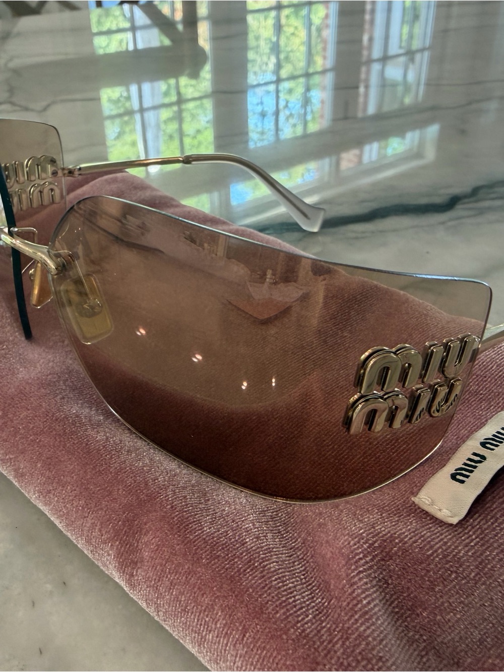 Miu Miu Rimless Shield Sunglasses in Rose Gradient with Gold Logo